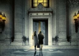 Strike and Robin walking into a building