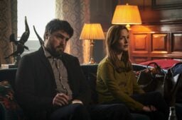 Strike and Robin sitting on the sofa