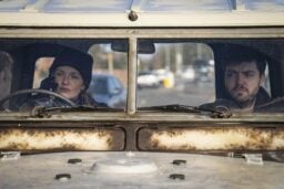 strike and robin sitting in Landrover